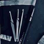 crochet hooks and Chinese calligraphy brushes

