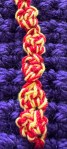 red and yellow crochet chain representing wildfires
